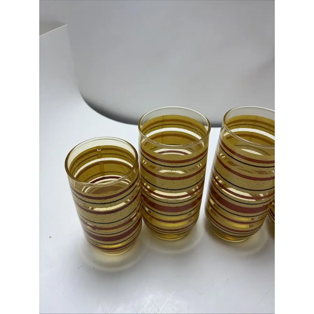 Mid Century Modern amber glass juice tumblers yellow red stripe speckled Anchor